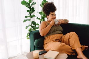 woman-sits-on-couch